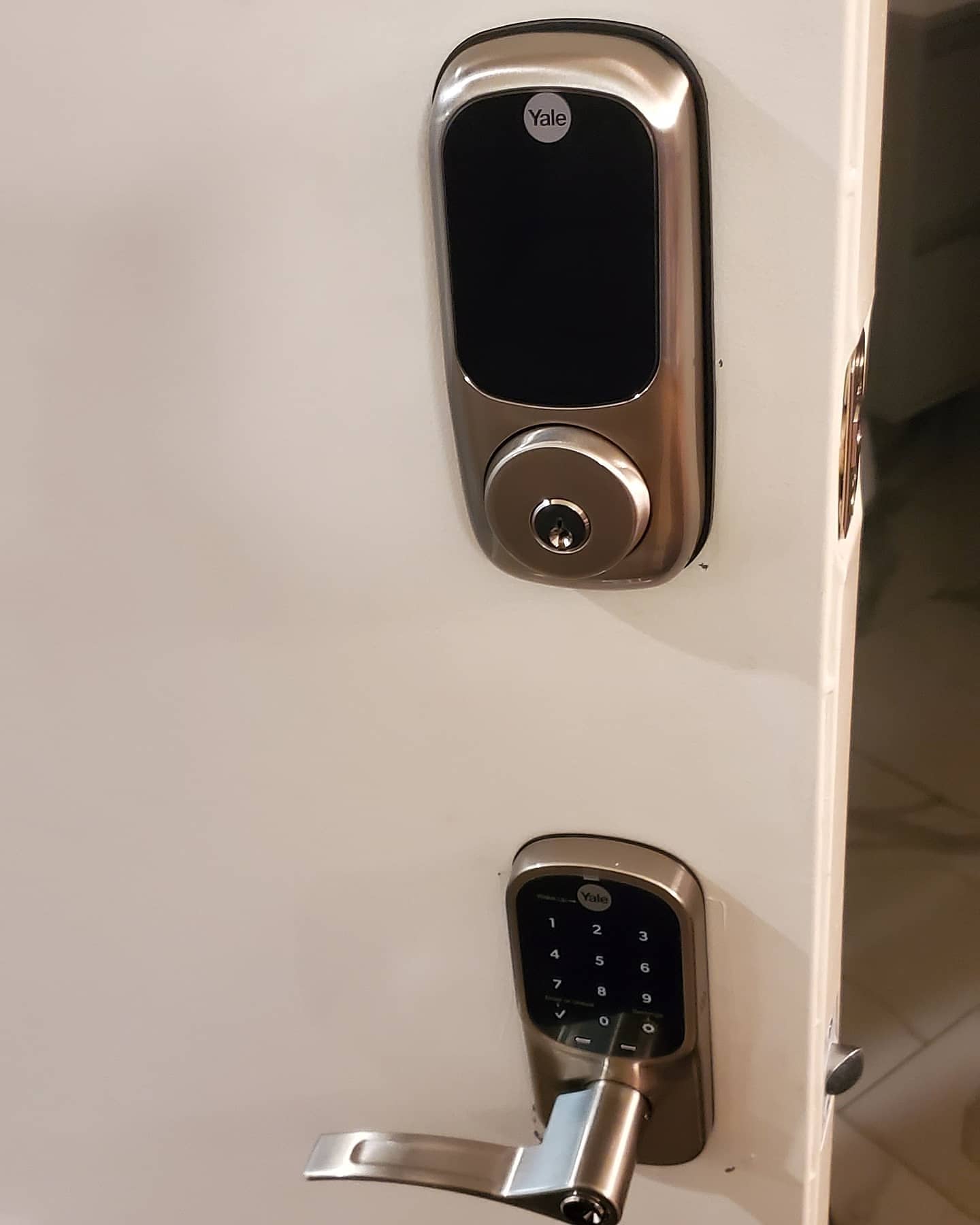 Yale smart locks installed on apartment door